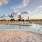 Outdoor swimming pool with zero entry and sun deck at The Reef at Winkler