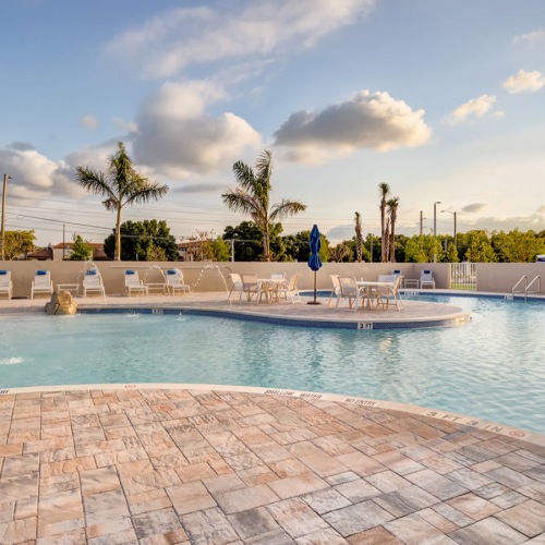 Beach entry pool and sun deck Outdoor swimming pool with zero entry and sun deck at The Reef at Winkler