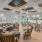 Inset ceiling with recessed lighting and ceiling fans in resident clubhouse at The Reef at Winkler