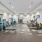 Fully-equipped fitness center with interactive workouts and recessed lighting throughout at The Reef at Winkler