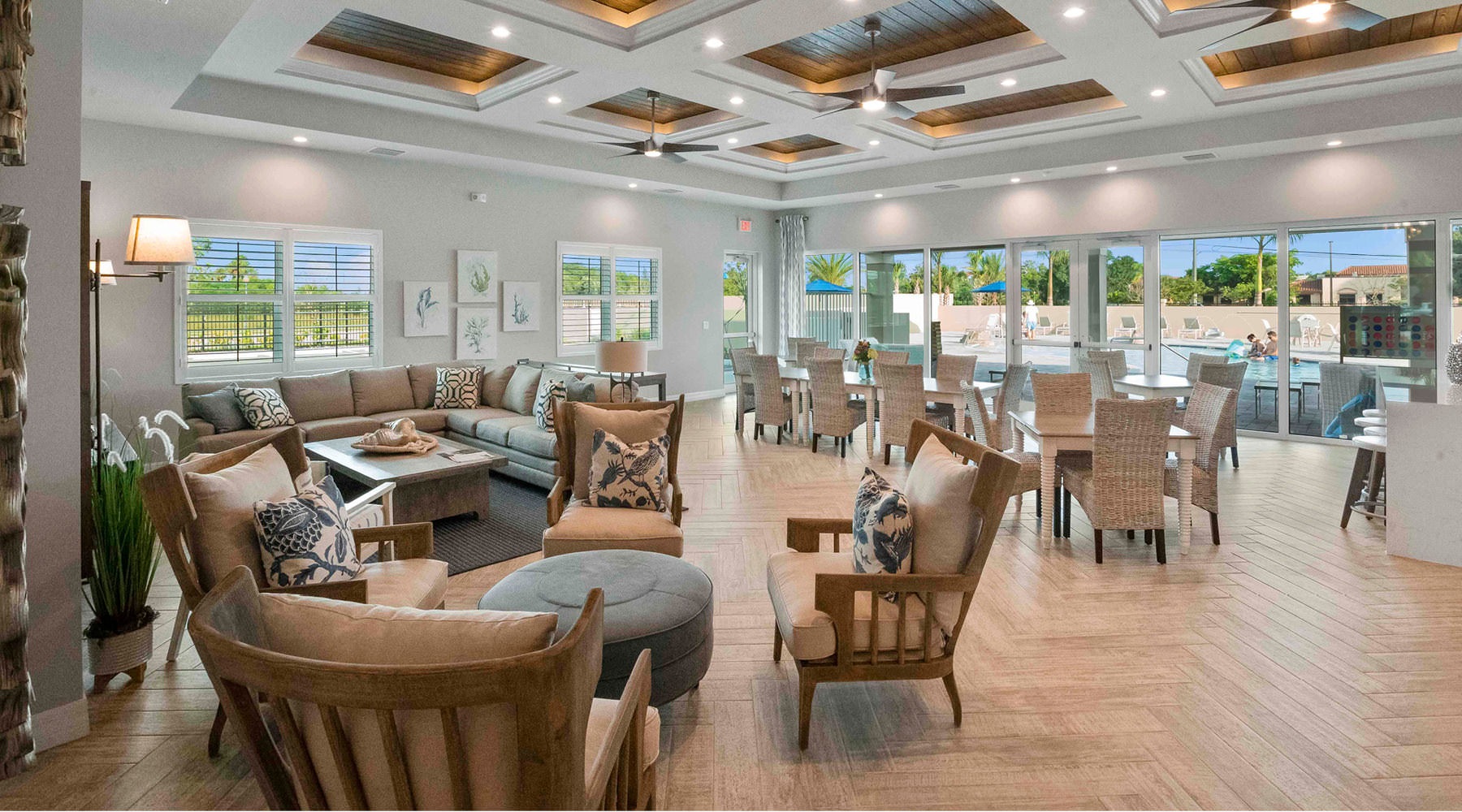 An Easier Way of Living inset ceiling with recessed lighting and ceiling fans throughout clubhouse